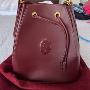 Bucket- drawstring bag from Cartier. I know deep but a goodie!